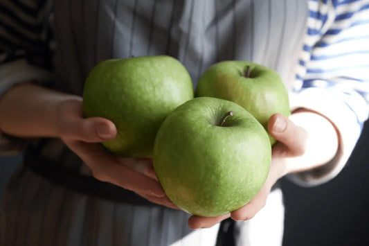 Green, golden apple